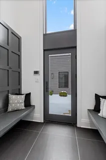 a living room with furniture and a gate