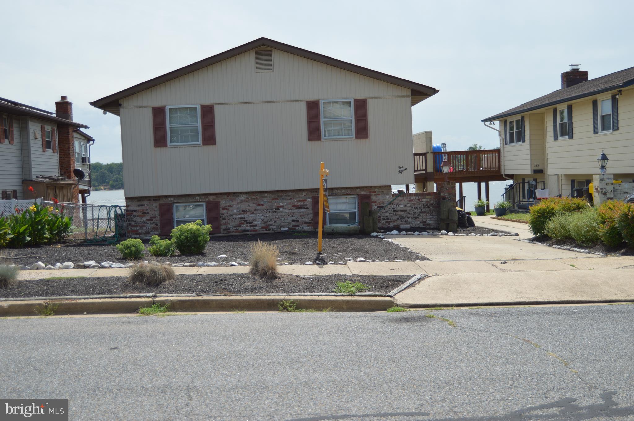 Professionally landscaped with no grass to cut