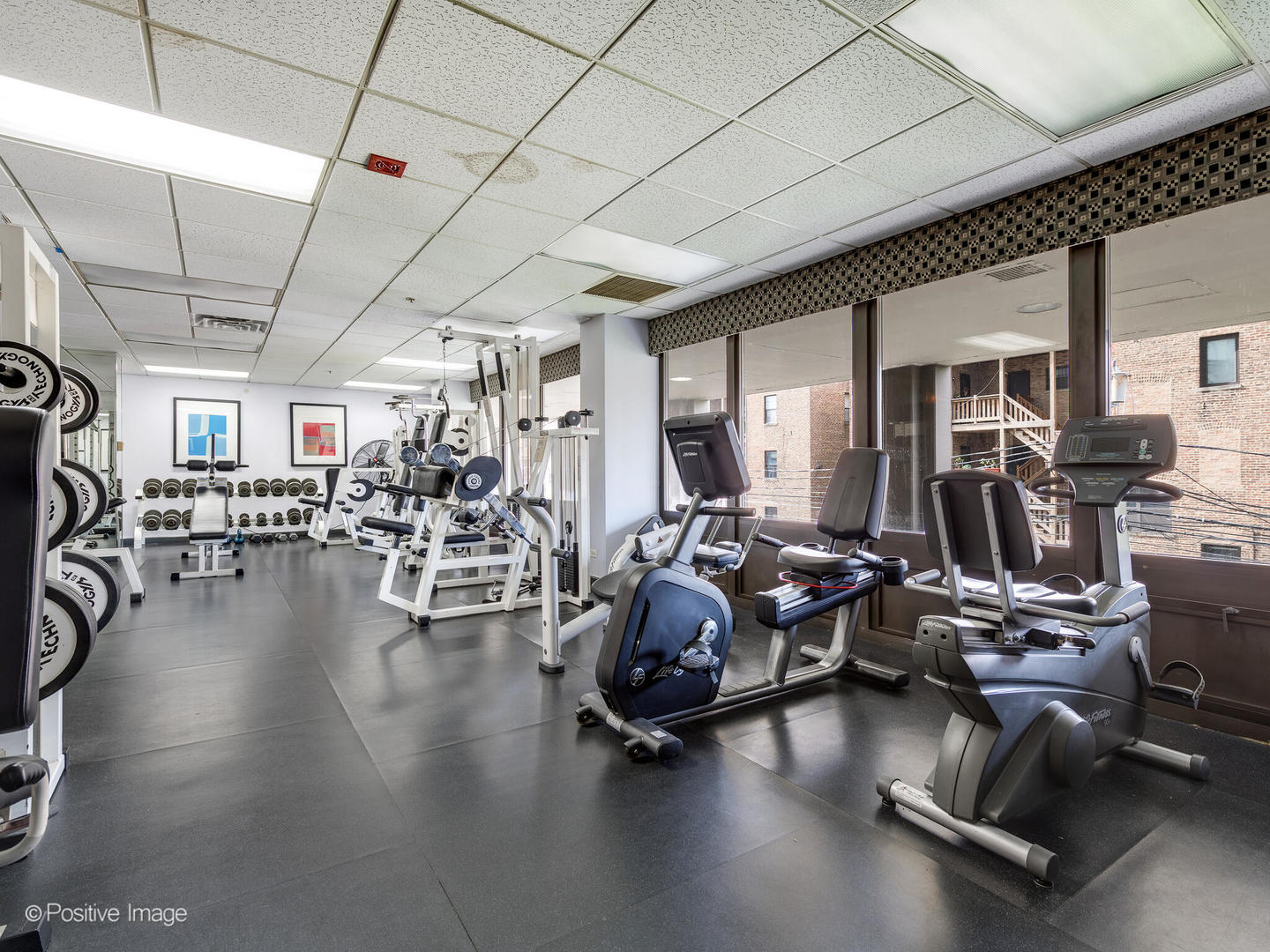 5320 North Sheridan Road, Unit 2206 Chicago, IL 60640 - Photo 15 of 20 a view of a room with gym equipment