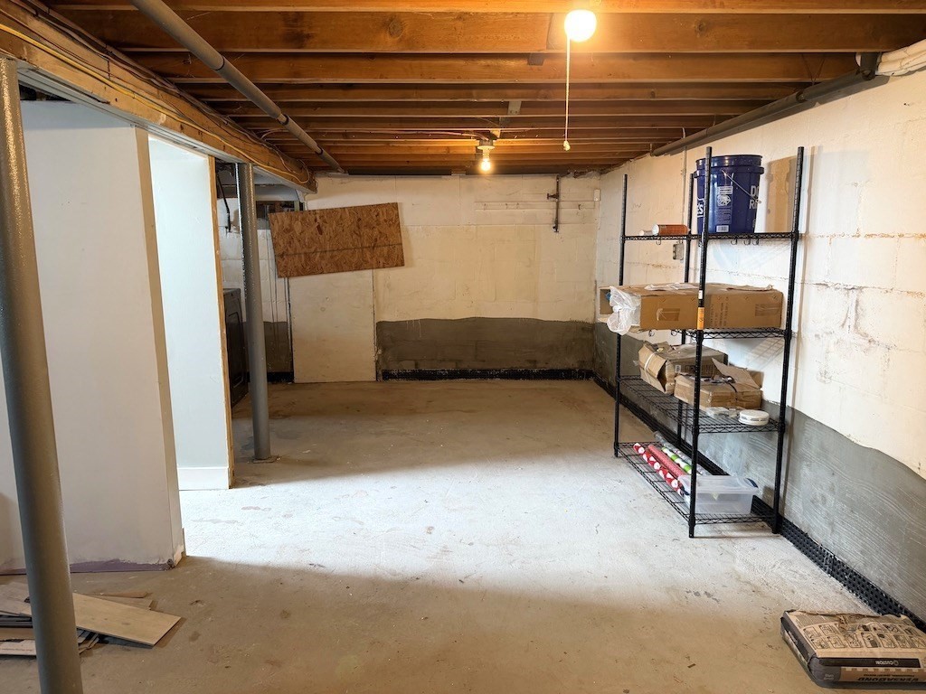 493 Rivet Street New Bedford, MA 02740 - Photo 17 of 20 a view of a room with wooden walls