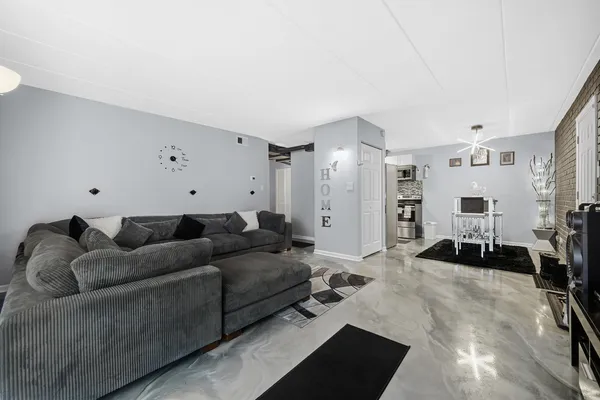 a living room with furniture and a couch