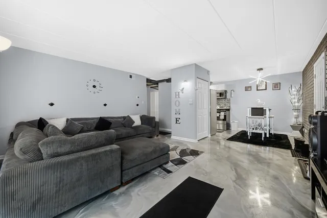 a living room with furniture and a couch