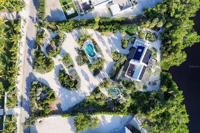 a view of a balcony with chair and table