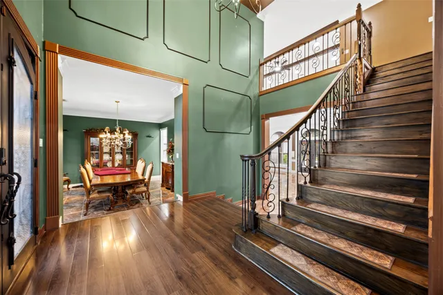 a view of entryway with wooden floor