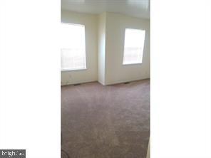 211 A Willow Turn, Unit 2 Mount Laurel, NJ 08054 - Photo 6 of 8 a view of an empty room with window
