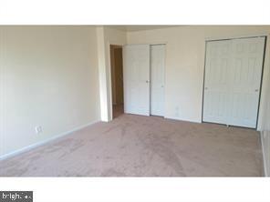 211 A Willow Turn, Unit 2 Mount Laurel, NJ 08054 - Photo 7 of 8 a open hall with a bed