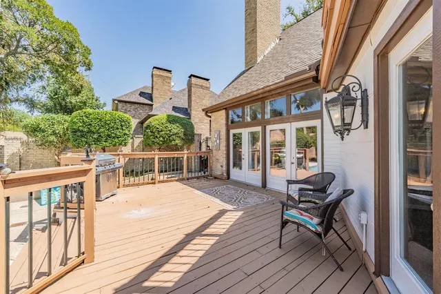 a view of a chairs and tables in the balcony