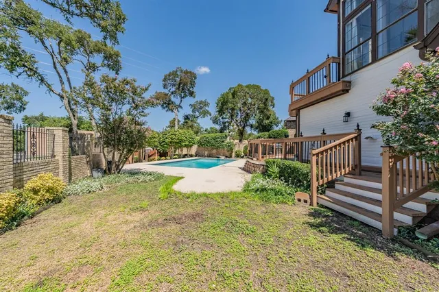 an aerial view of a house with a garden