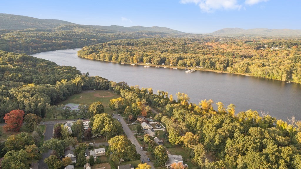 90 Oxford Road Holyoke, MA 01040 - Photo 1 of 29 a view of lake with mountain