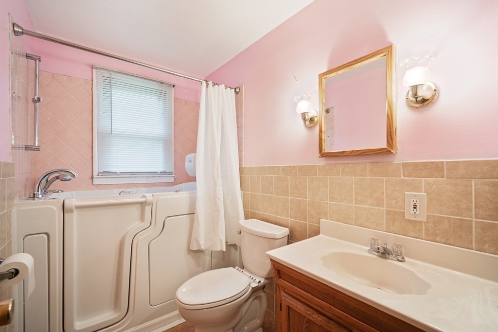 90 Oxford Road Holyoke, MA 01040 - Photo 17 of 29 a bathroom with a sink toilet and mirror