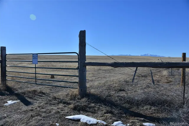 a view of a backyard of the house