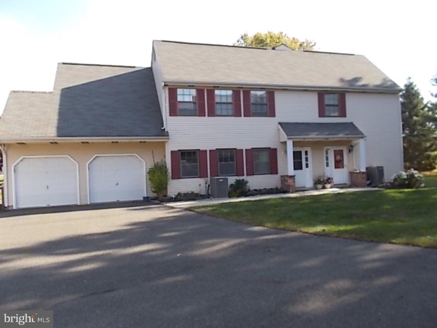 430 B Willow Turn Mount Laurel, NJ 08054 - Photo 1 of 19 a front view of a house with a garden and yard