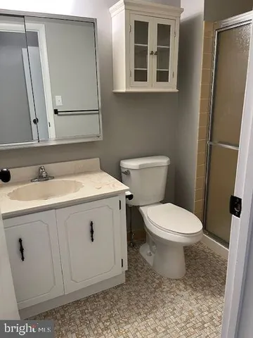 a bathroom with a sink and a toilet