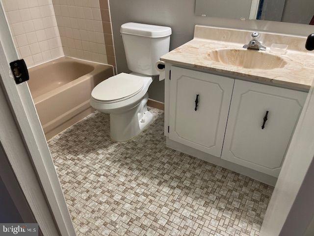430 B Willow Turn Mount Laurel, NJ 08054 - Photo 14 of 19 a bathroom with a granite countertop toilet sink and mirror