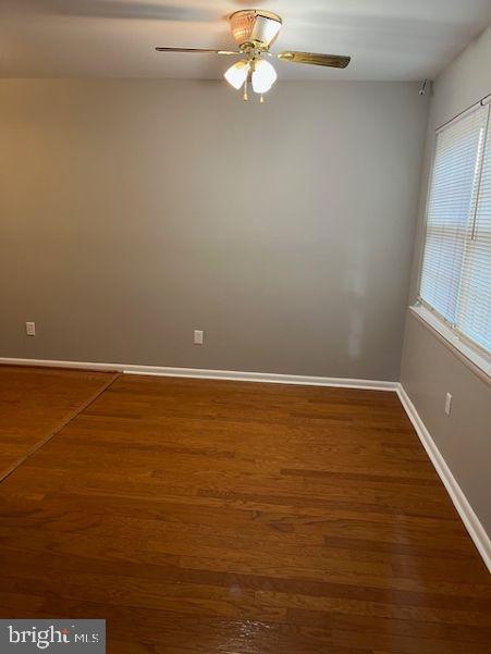 430 B Willow Turn Mount Laurel, NJ 08054 - Photo 15 of 19 a view of an empty room with wooden floor and a window