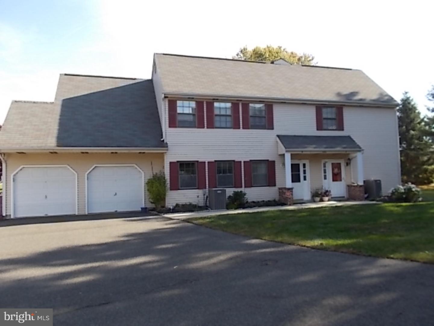430 B Willow Turn Mount Laurel, NJ 08054 - Photo 16 of 19 a front view of a house with a garden