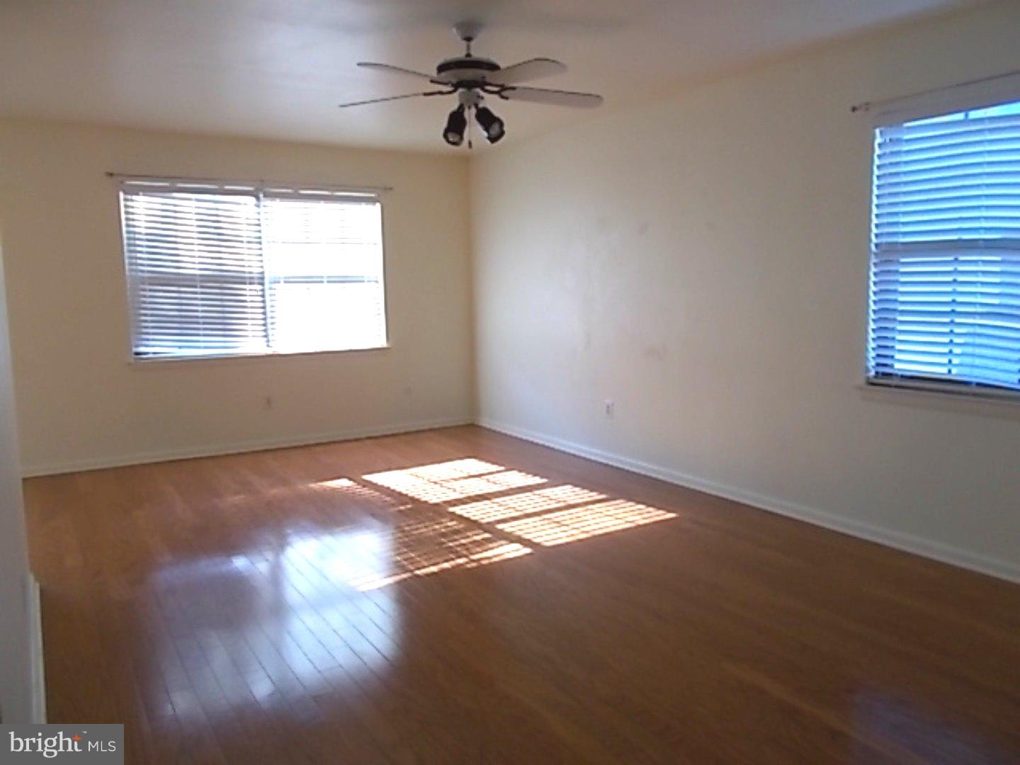 430 B Willow Turn Mount Laurel, NJ 08054 - Photo 2 of 19 a view of empty room with windows