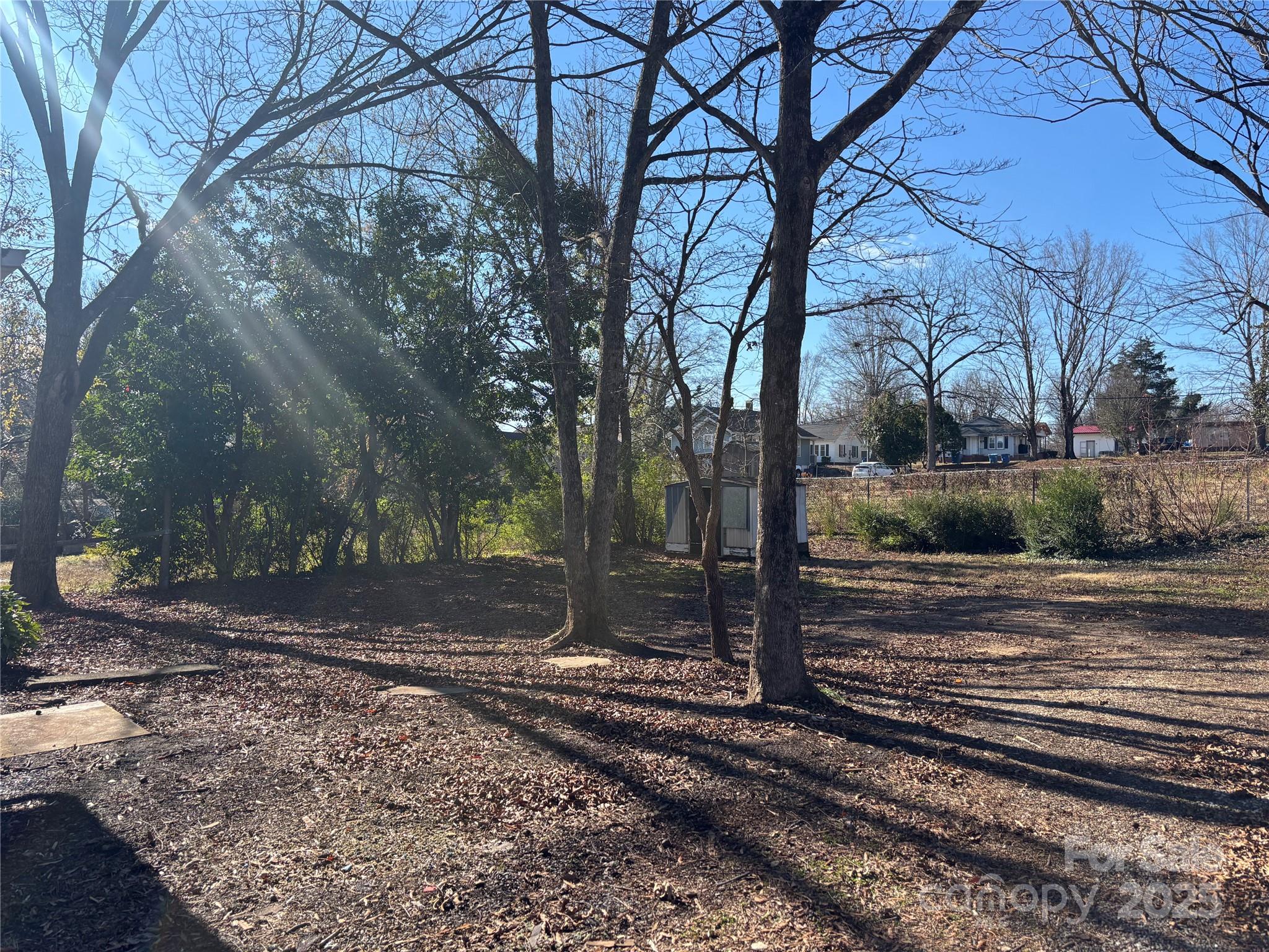 142 26th Street Southwest Hickory, NC 28602 - Photo 11 of 11 a view of a yard with tree s