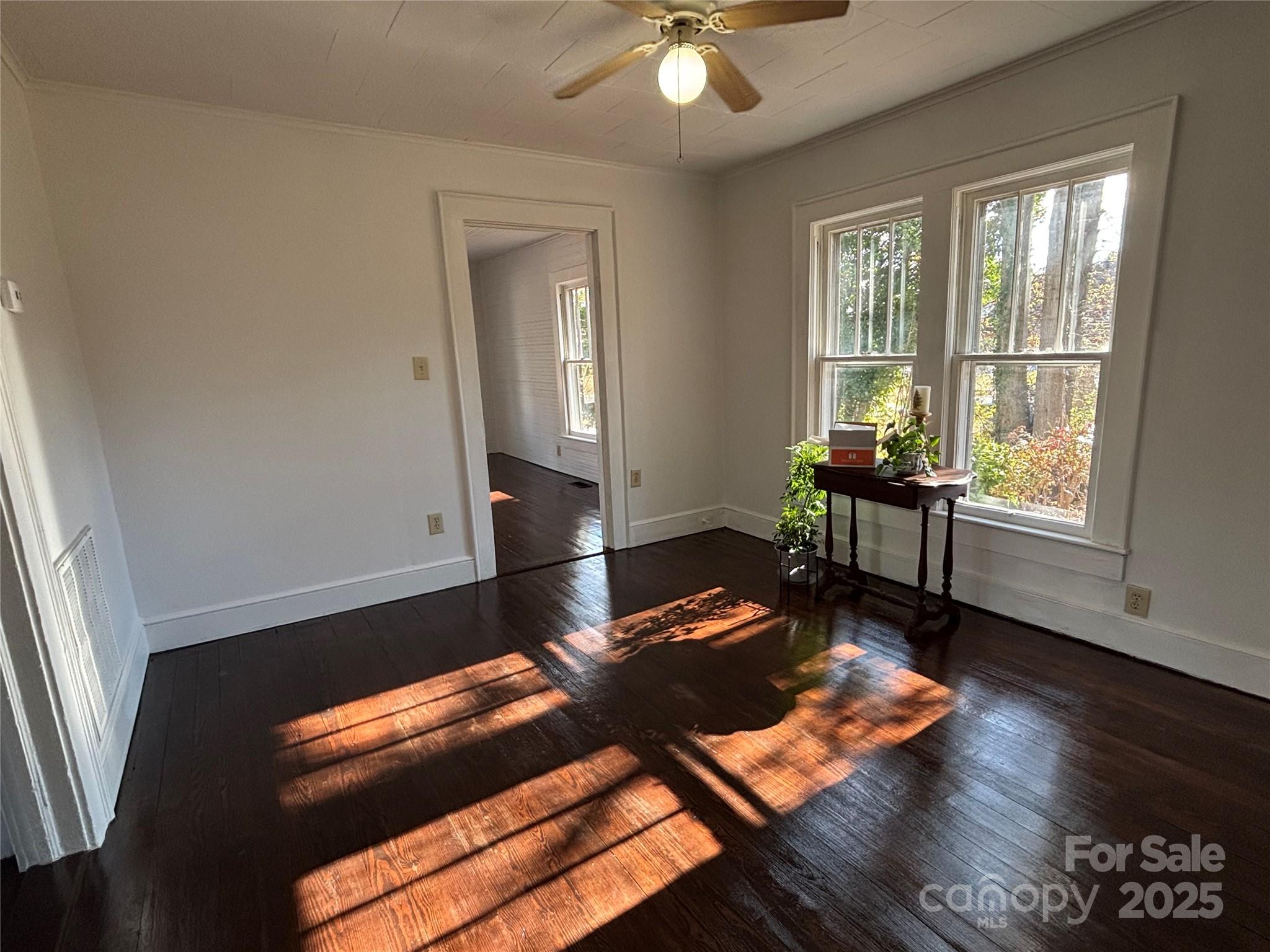 142 26th Street Southwest Hickory, NC 28602 - Photo 6 of 11 a living room with wooden floor and a window