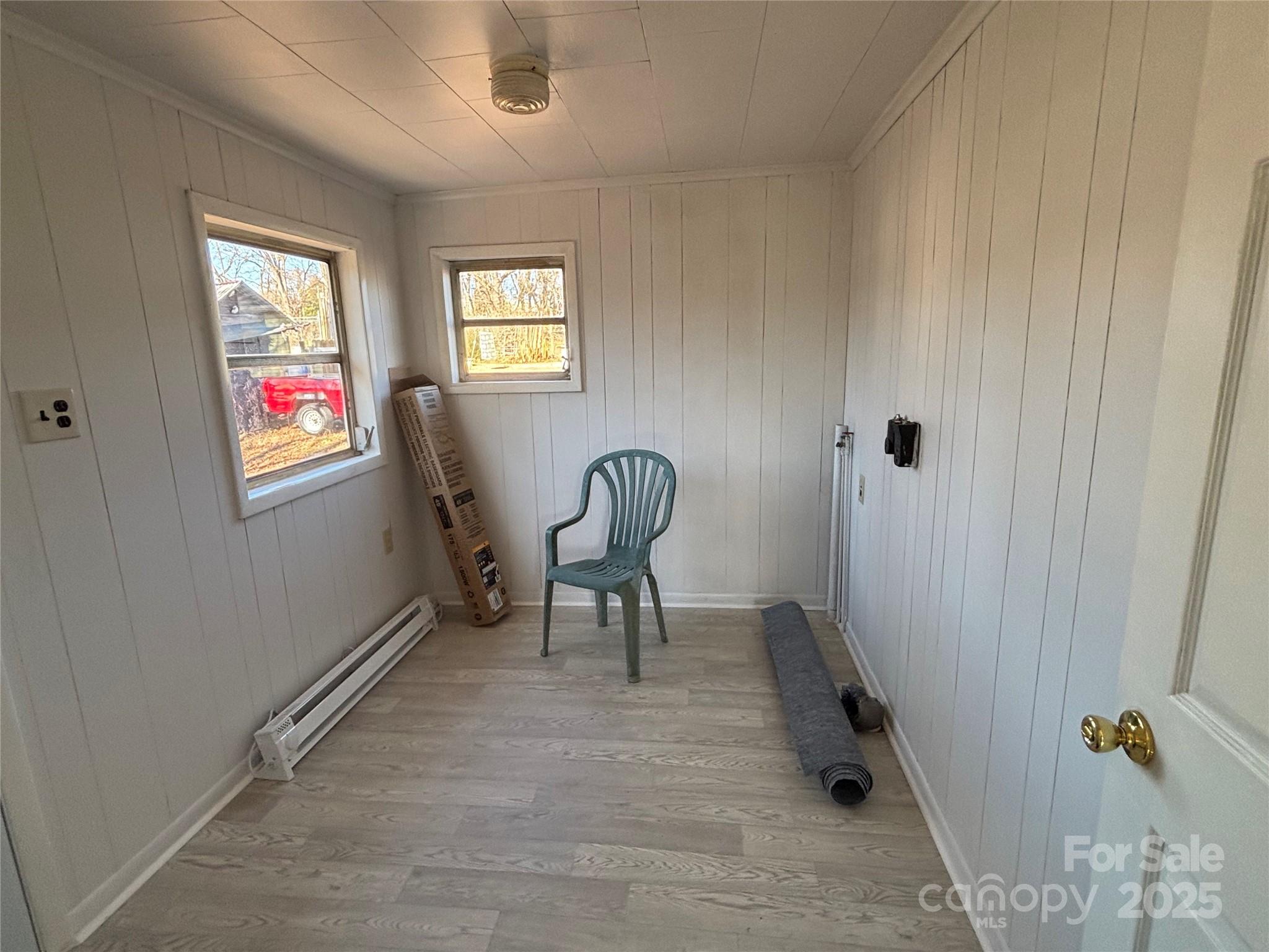 142 26th Street Southwest Hickory, NC 28602 - Photo 7 of 11 a hallway with chairs and a window