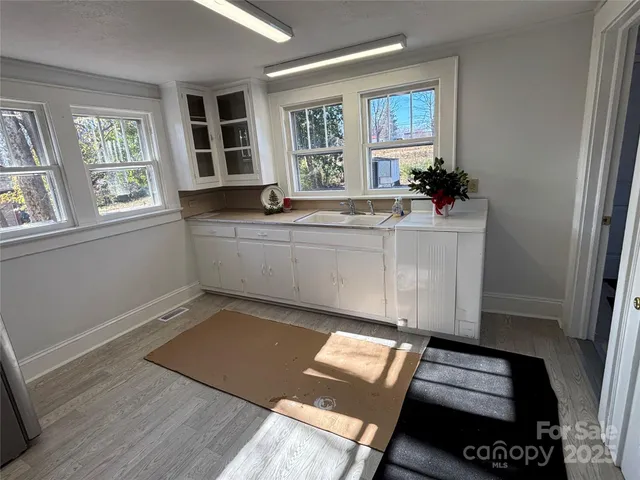 a bedroom with bed and window