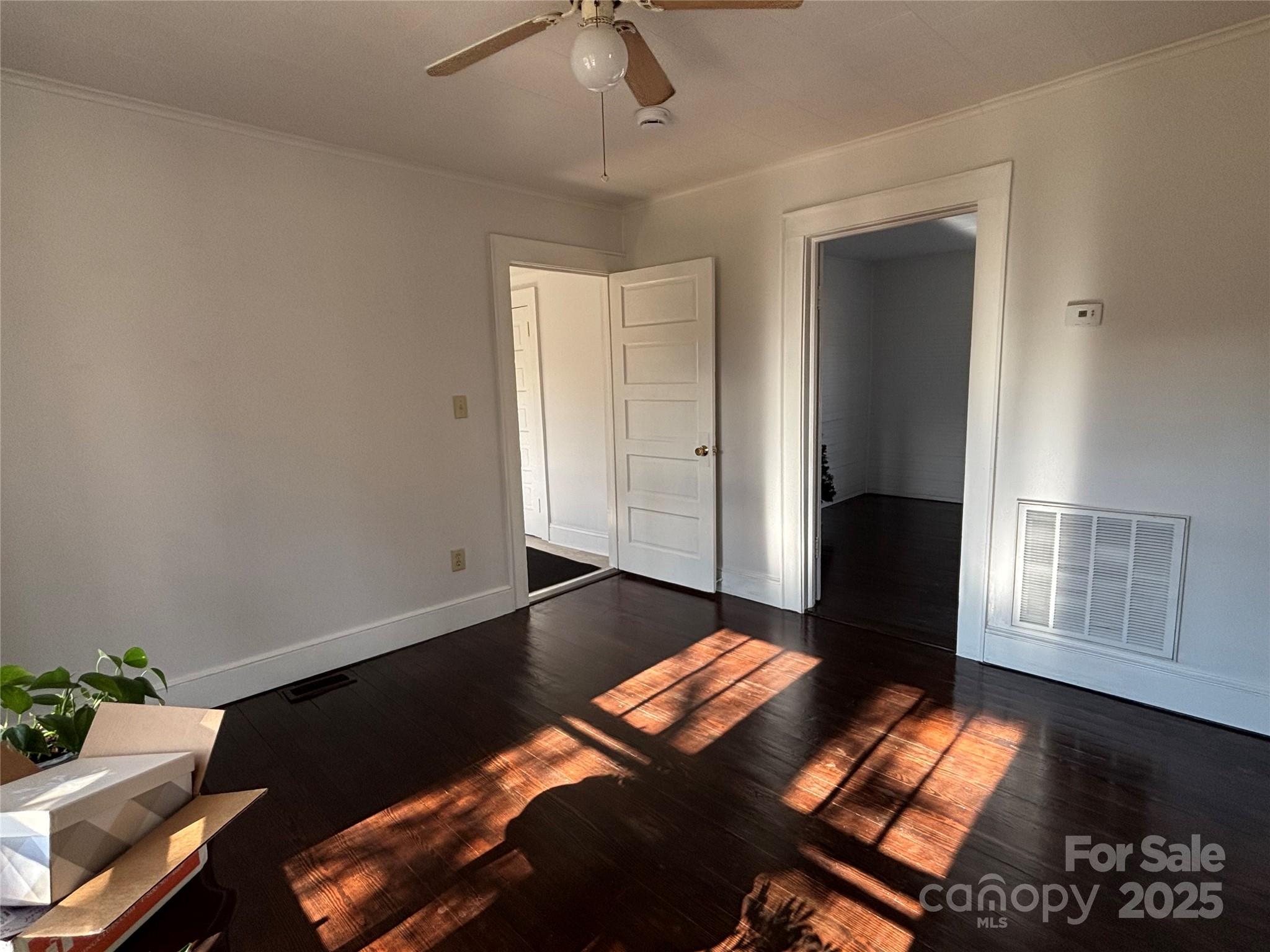 142 26th Street Southwest Hickory, NC 28602 - Photo 9 of 11 a bedroom with bed and window