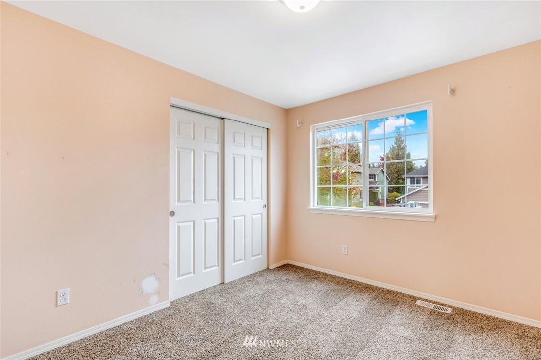 13402 Prospector Ridge Road Southeast Monroe, WA 98272 - Photo 16 of 30 an empty room with windows