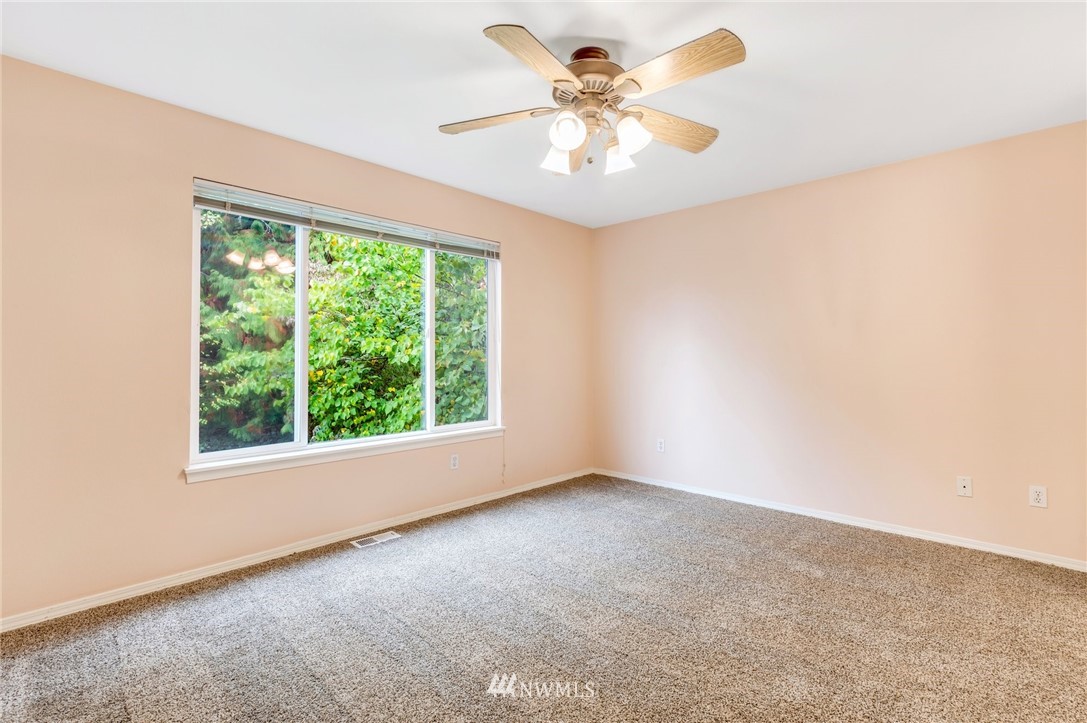 13402 Prospector Ridge Road Southeast Monroe, WA 98272 - Photo 19 of 30 an empty room with a window