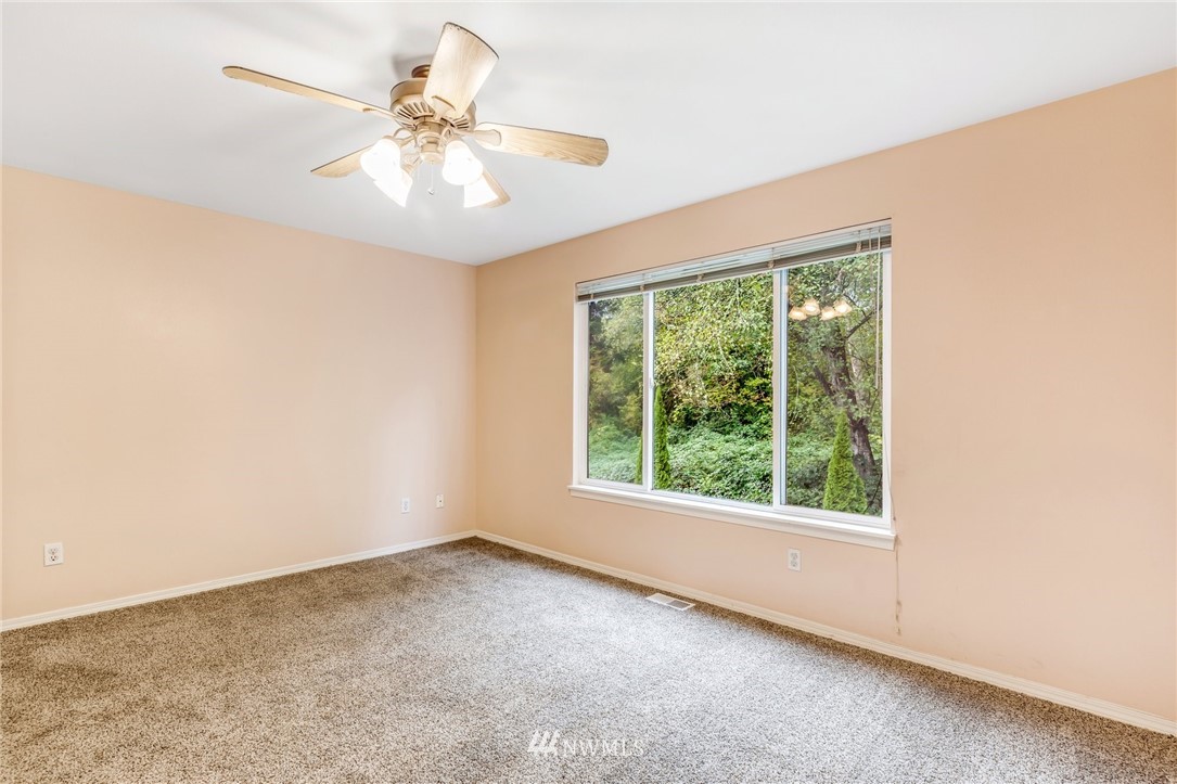 13402 Prospector Ridge Road Southeast Monroe, WA 98272 - Photo 20 of 30 a view of an empty room with a window