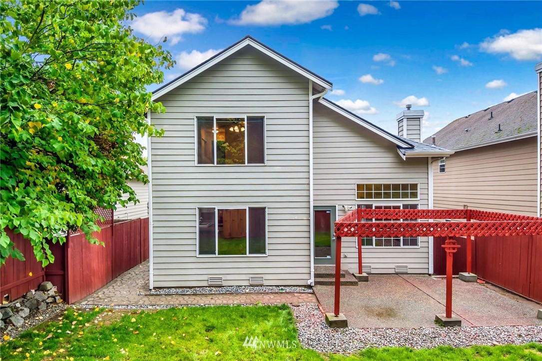 13402 Prospector Ridge Road Southeast Monroe, WA 98272 - Photo 24 of 30 a view of house with backyard