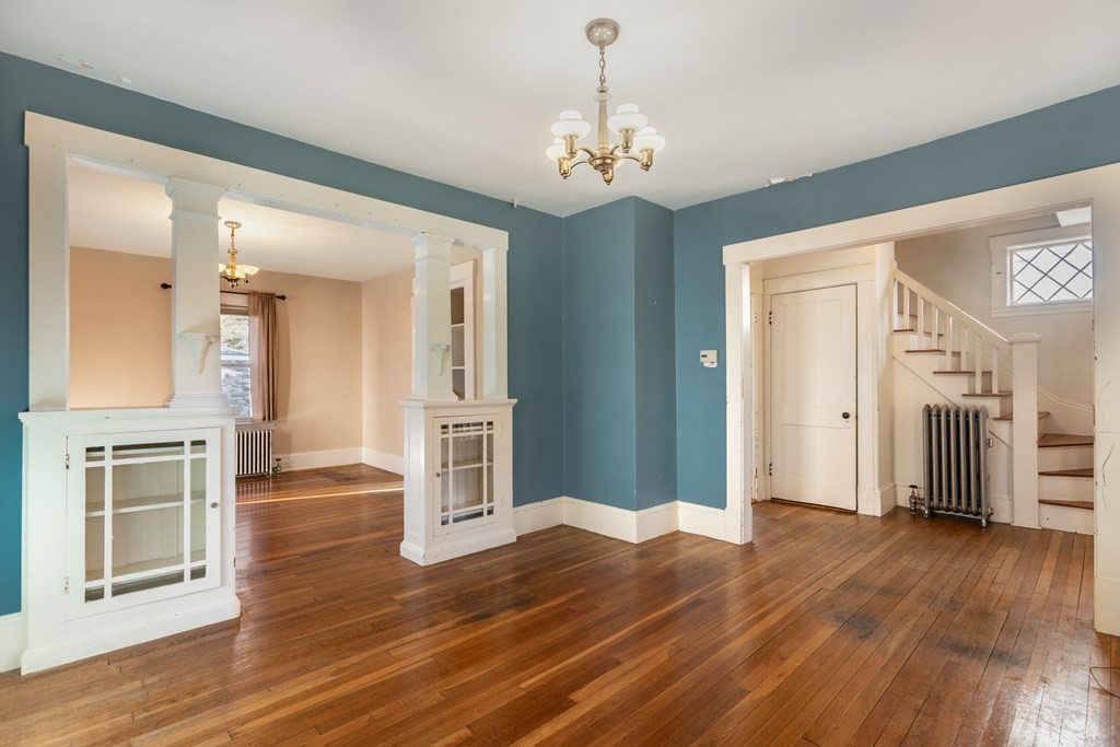 102 Great Road Maynard, MA 01754 - Photo 8 of 32 a view of a livingroom with wooden floor