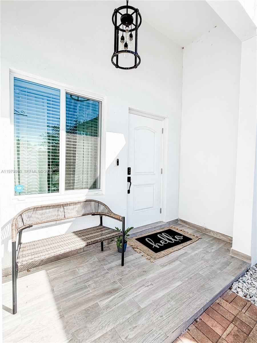 30725 Southwest 158 Path Homestead, FL 33033 - Photo 2 of 29 a living room with furniture and window