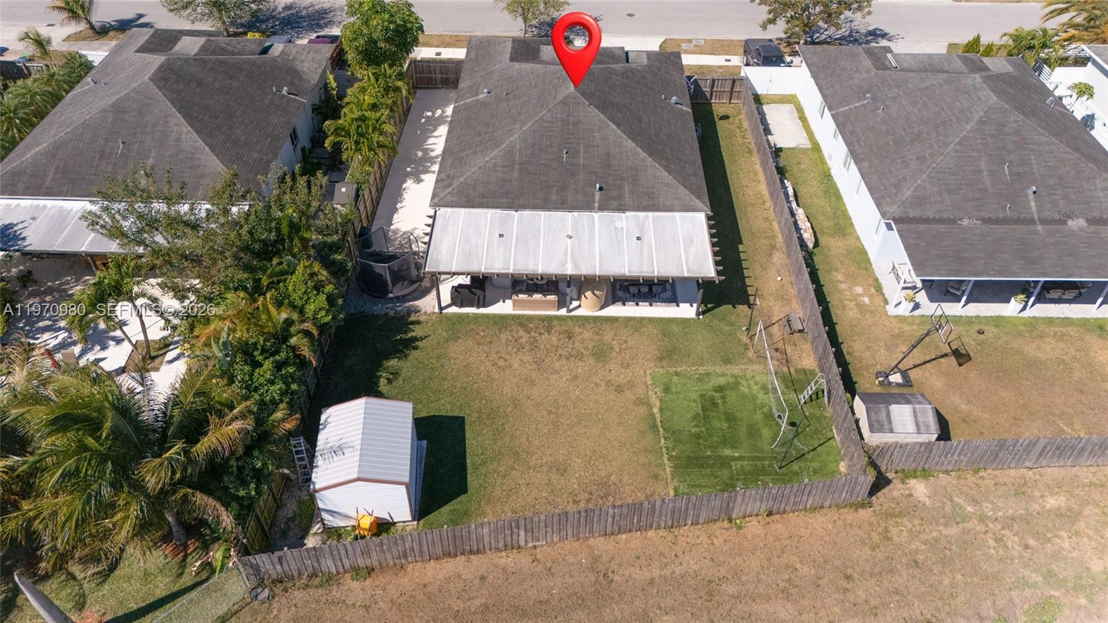 30725 Southwest 158 Path Homestead, FL 33033 - Photo 26 of 29 an aerial view of a house with swimming pool and large trees