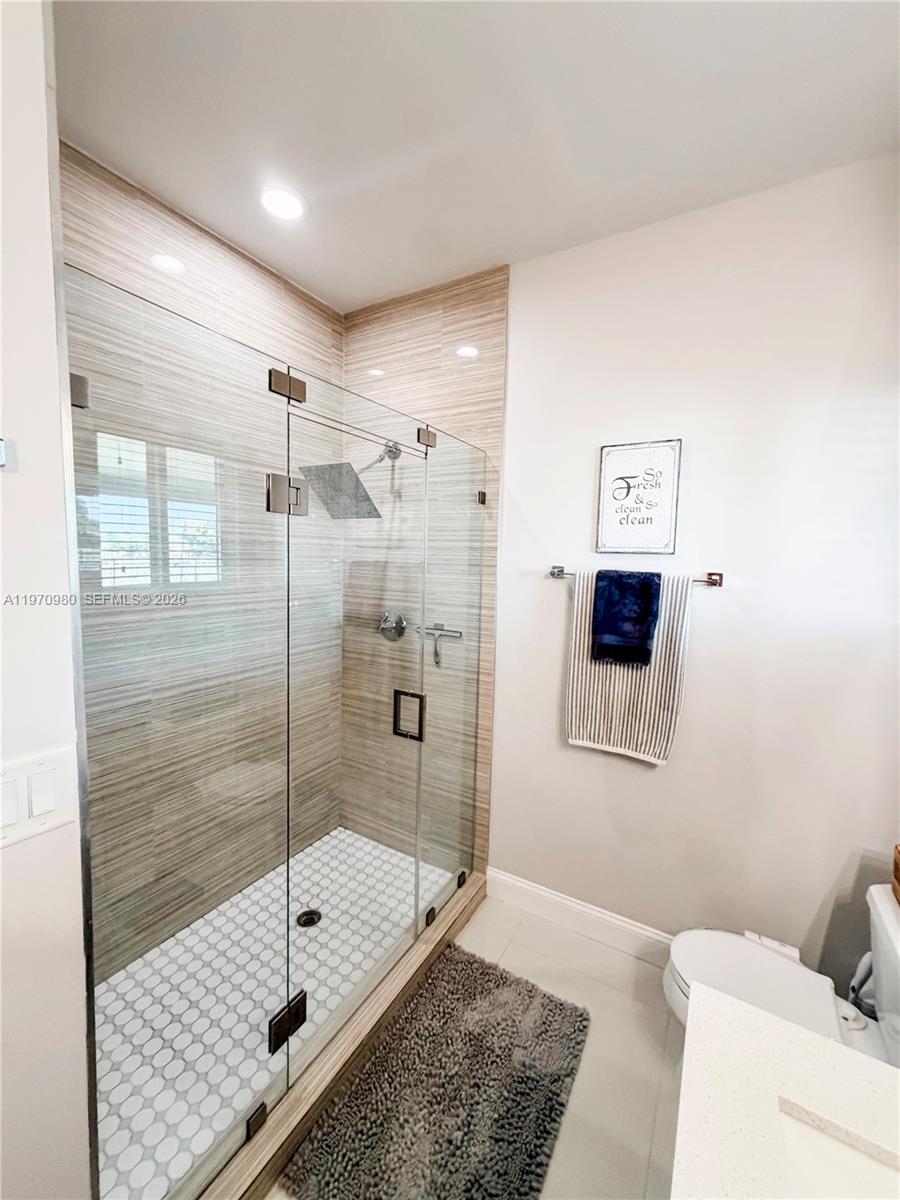 30725 Southwest 158 Path Homestead, FL 33033 - Photo 10 of 29 a bathroom with a shower