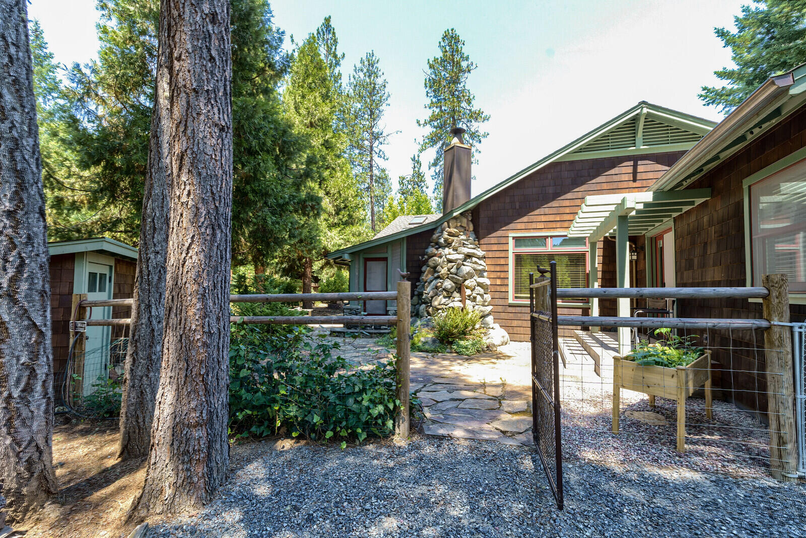 281 Rossier Lane Grants Pass, OR 97527 - Photo 12 of 63 a view of backyard of house with green space and seating space