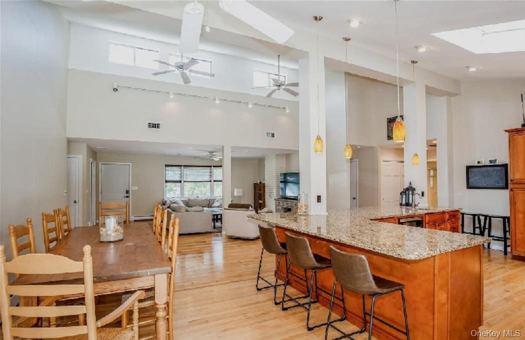 215 Northfield Road Southold, NY 11971 - Photo 20 of 20 a large kitchen with a table and chairs