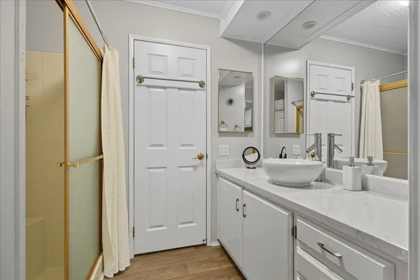 a bathroom with a double vanity sink mirror and double