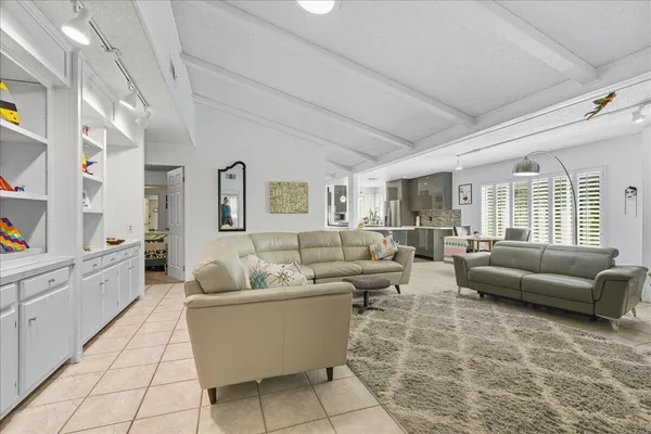 a living room with furniture and a couch