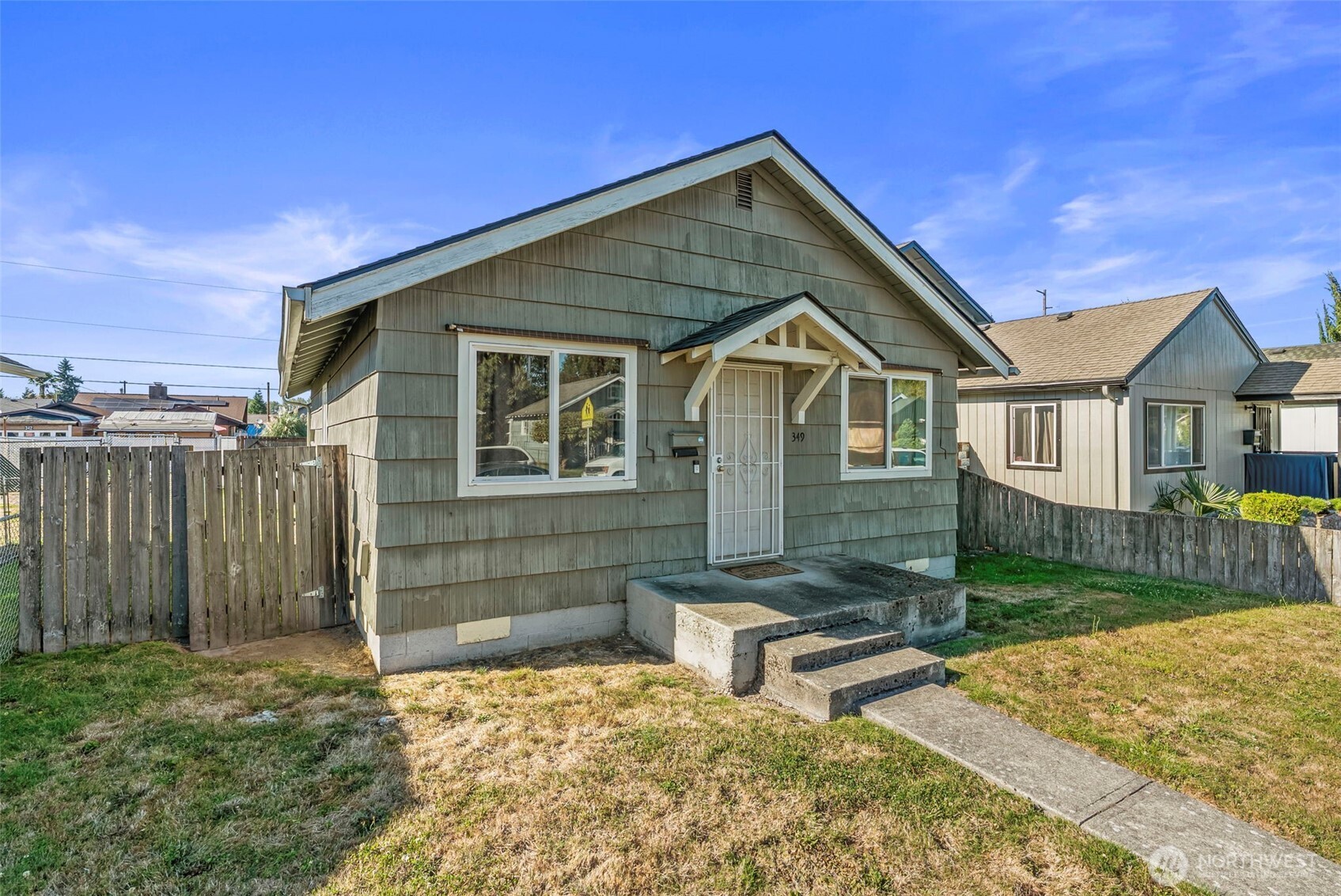 349 27th Avenue Longview, WA 98632 - Photo 2 of 23 a front view of a house with a yard