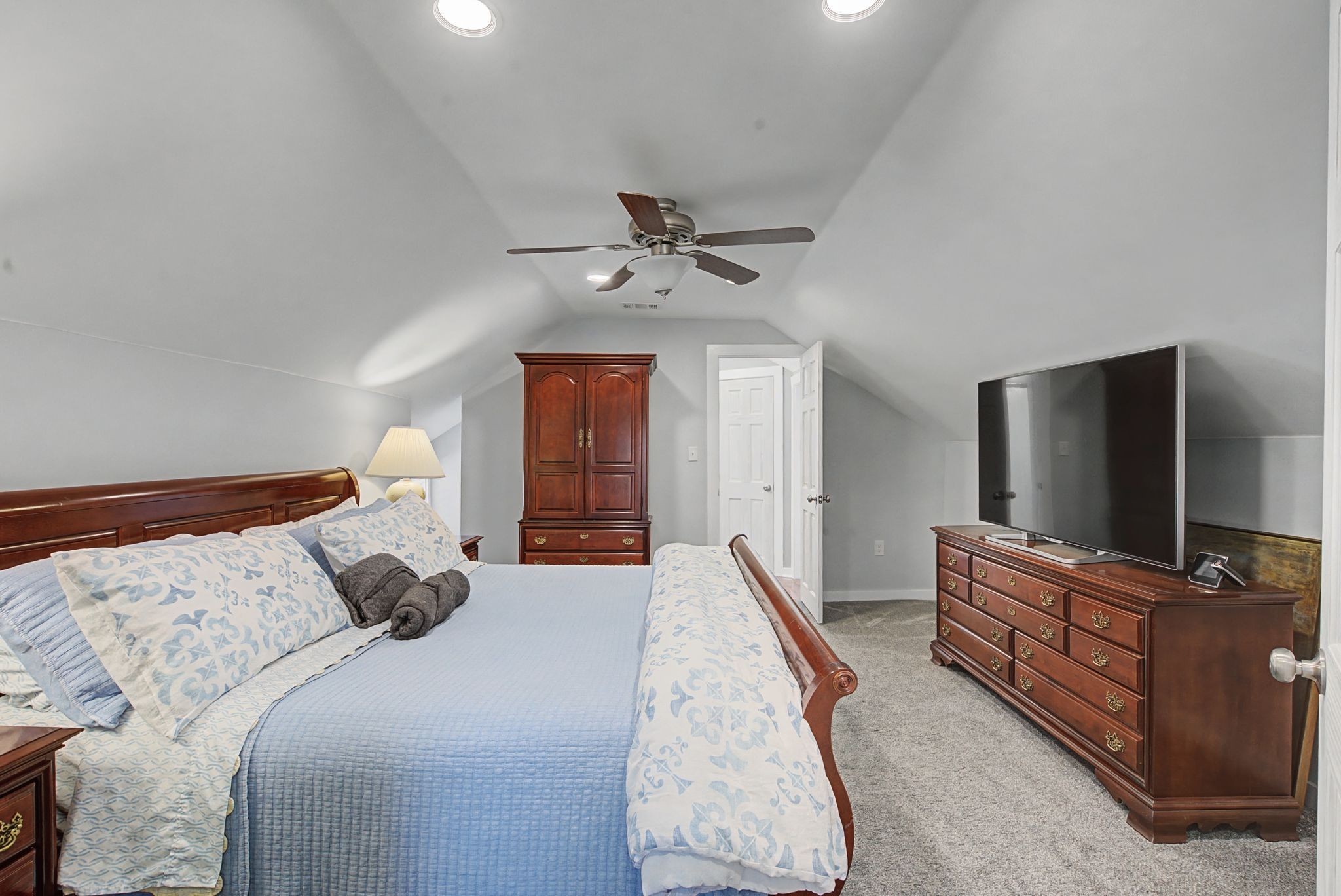 77 Warren Hollow Road Five Points, TN 38457 - Photo 21 of 45 a bedroom with a bed and a flat screen tv