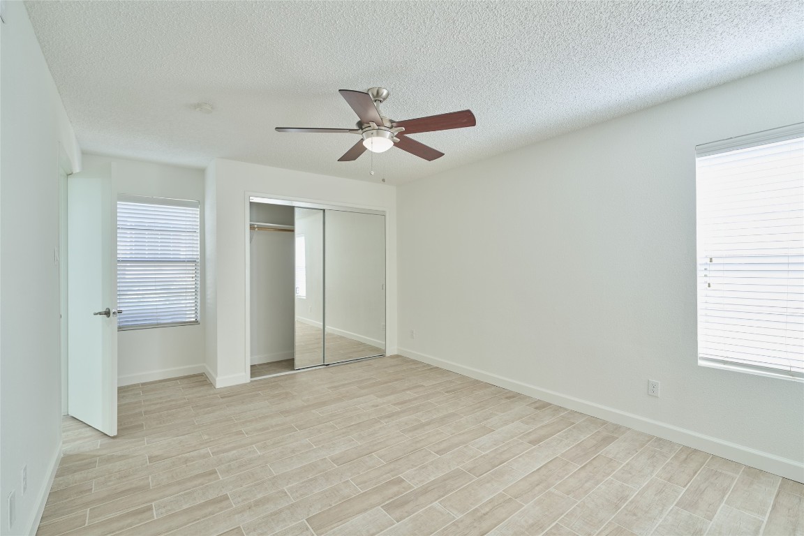12900 Walden Road, Unit 601F Montgomery, TX 77356 - Photo 18 of 28 a view of an empty room with a window