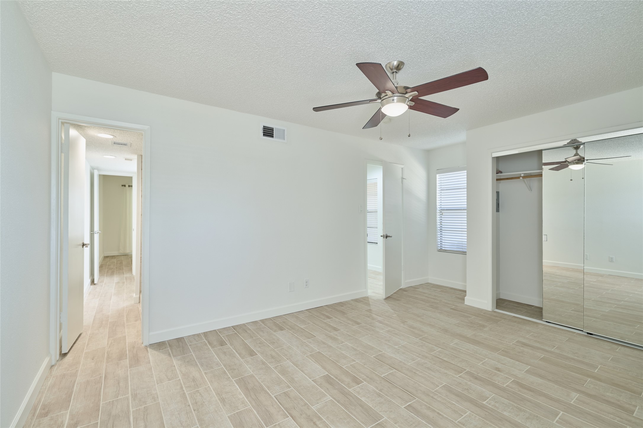 12900 Walden Road, Unit 601F Montgomery, TX 77356 - Photo 19 of 28 another bedroom photo. You have bathroom access from the living room and the bedroom