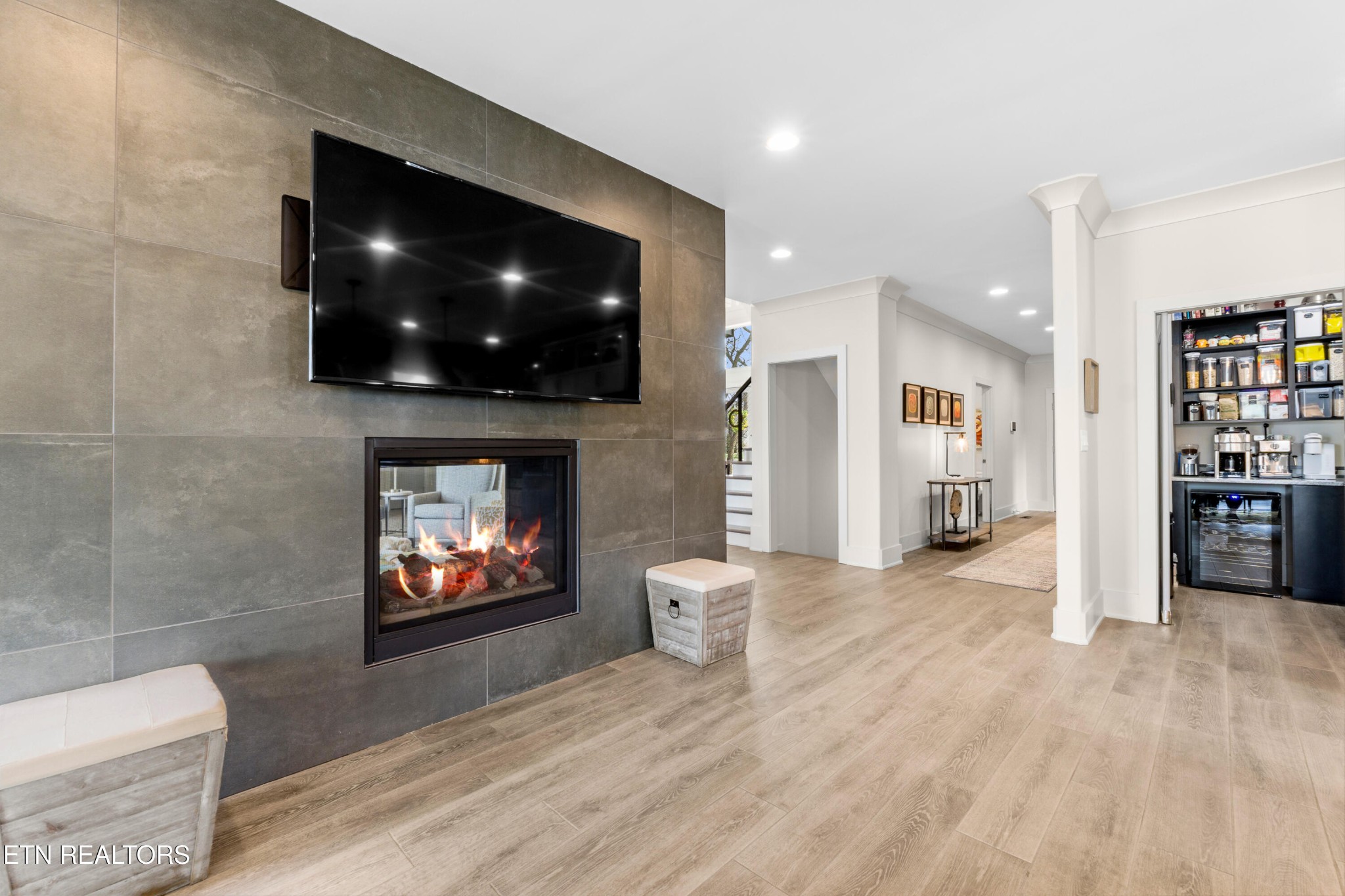 3702 Promontory Point Louisville, TN 37777 - Photo 5 of 60 a living room with furniture a flat screen tv and a fireplace