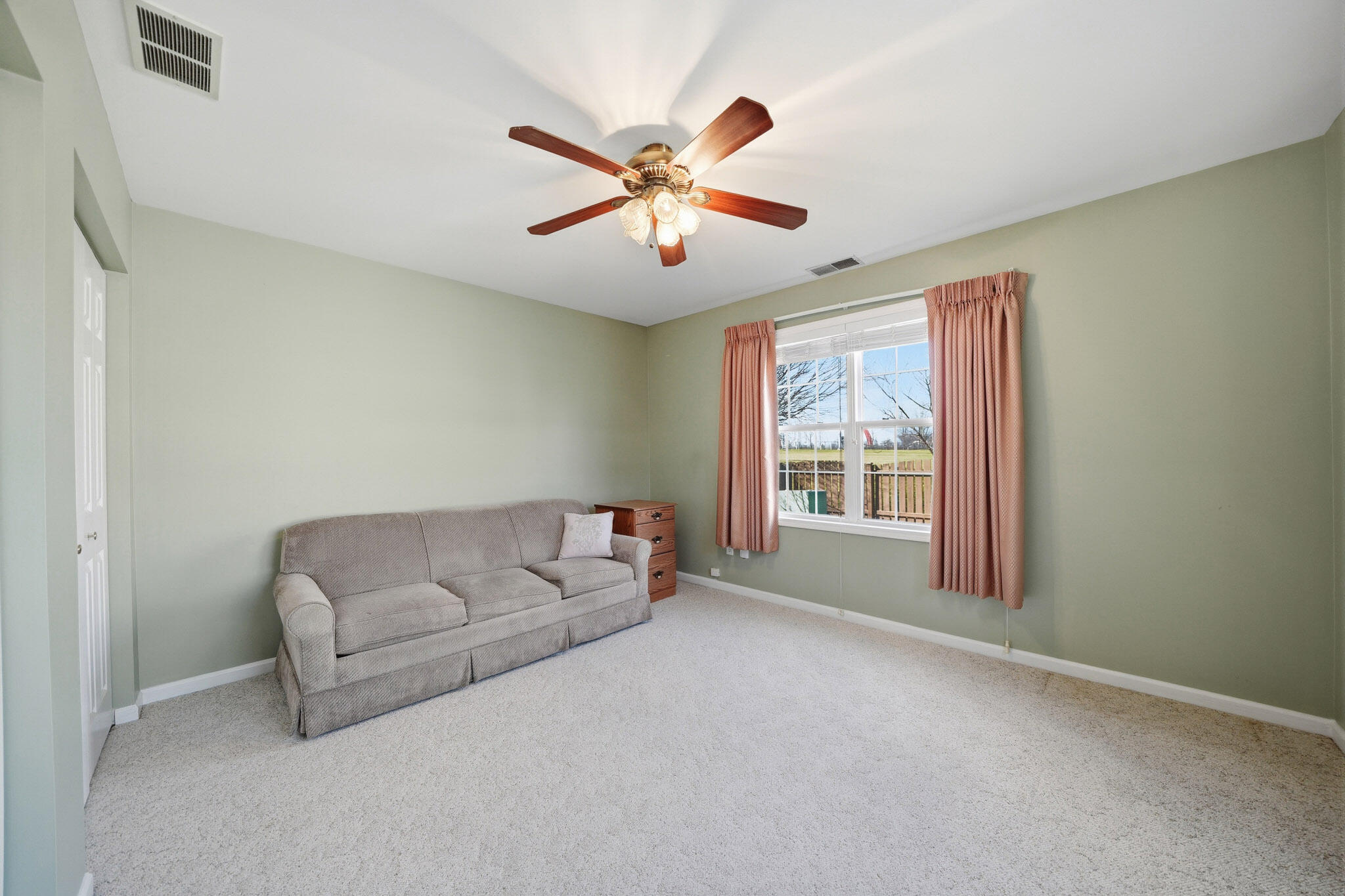 285 North Heather Lane Crown Point, IN 46307 - Photo 12 of 17 a living room with furniture and a large window