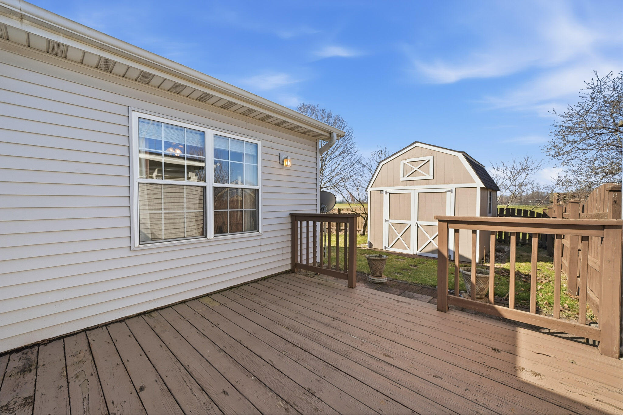 285 North Heather Lane Crown Point, IN 46307 - Photo 15 of 17 a view of a balcony with wooden floor