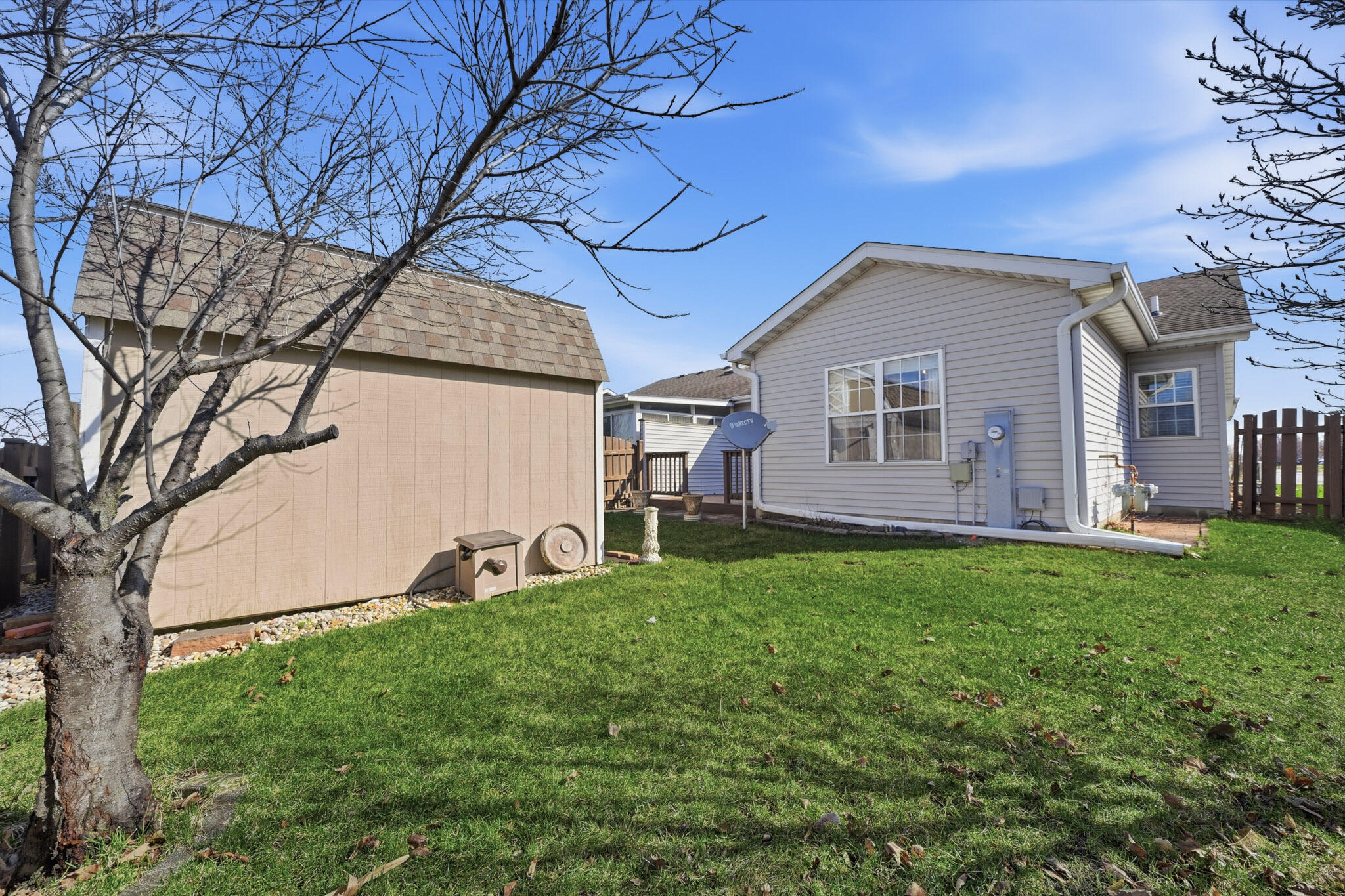 285 North Heather Lane Crown Point, IN 46307 - Photo 17 of 17 a backyard of a house with table and chairs