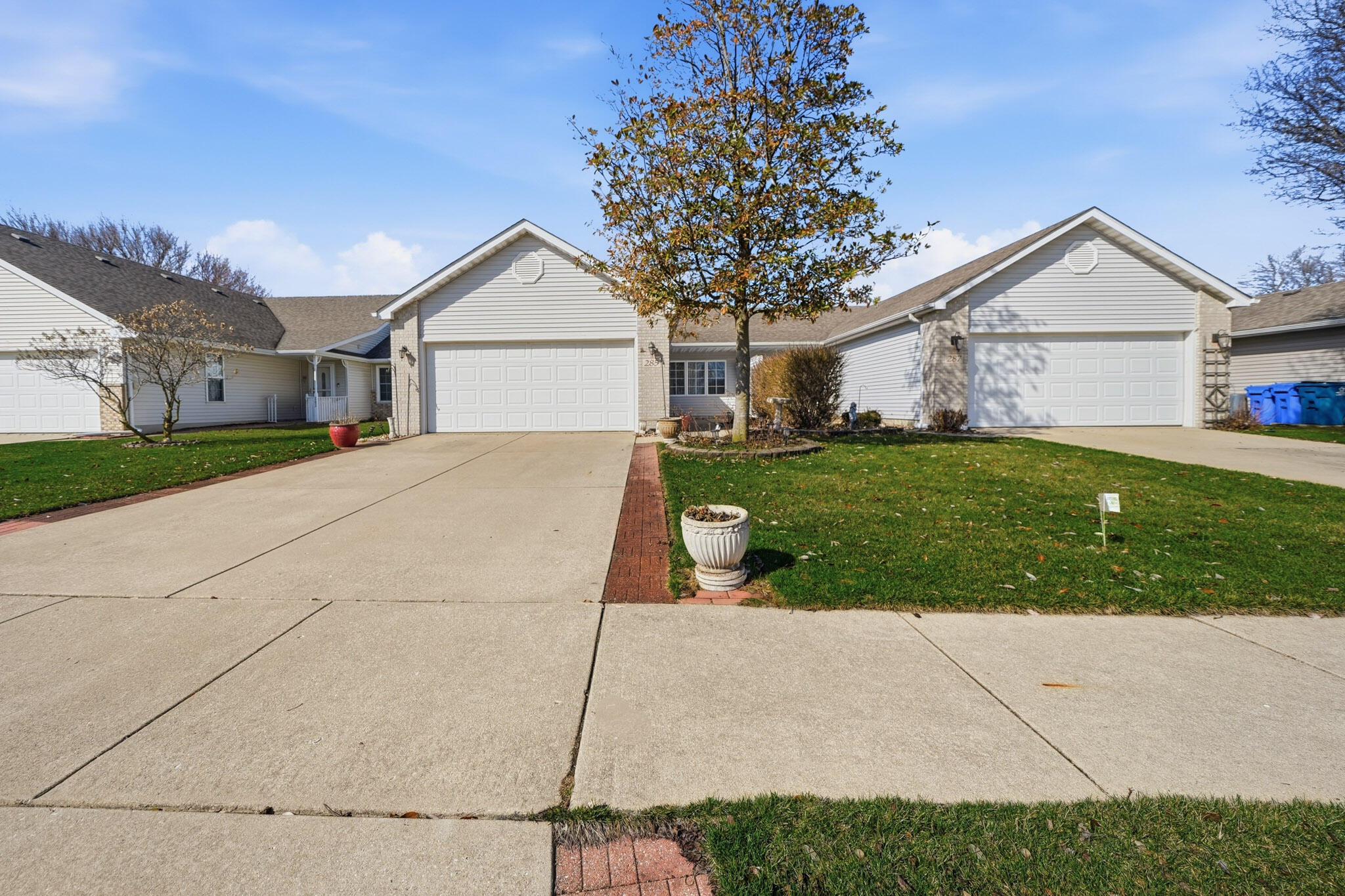 285 North Heather Lane Crown Point, IN 46307 - Photo 3 of 17 a view of house with a yard and potted plants