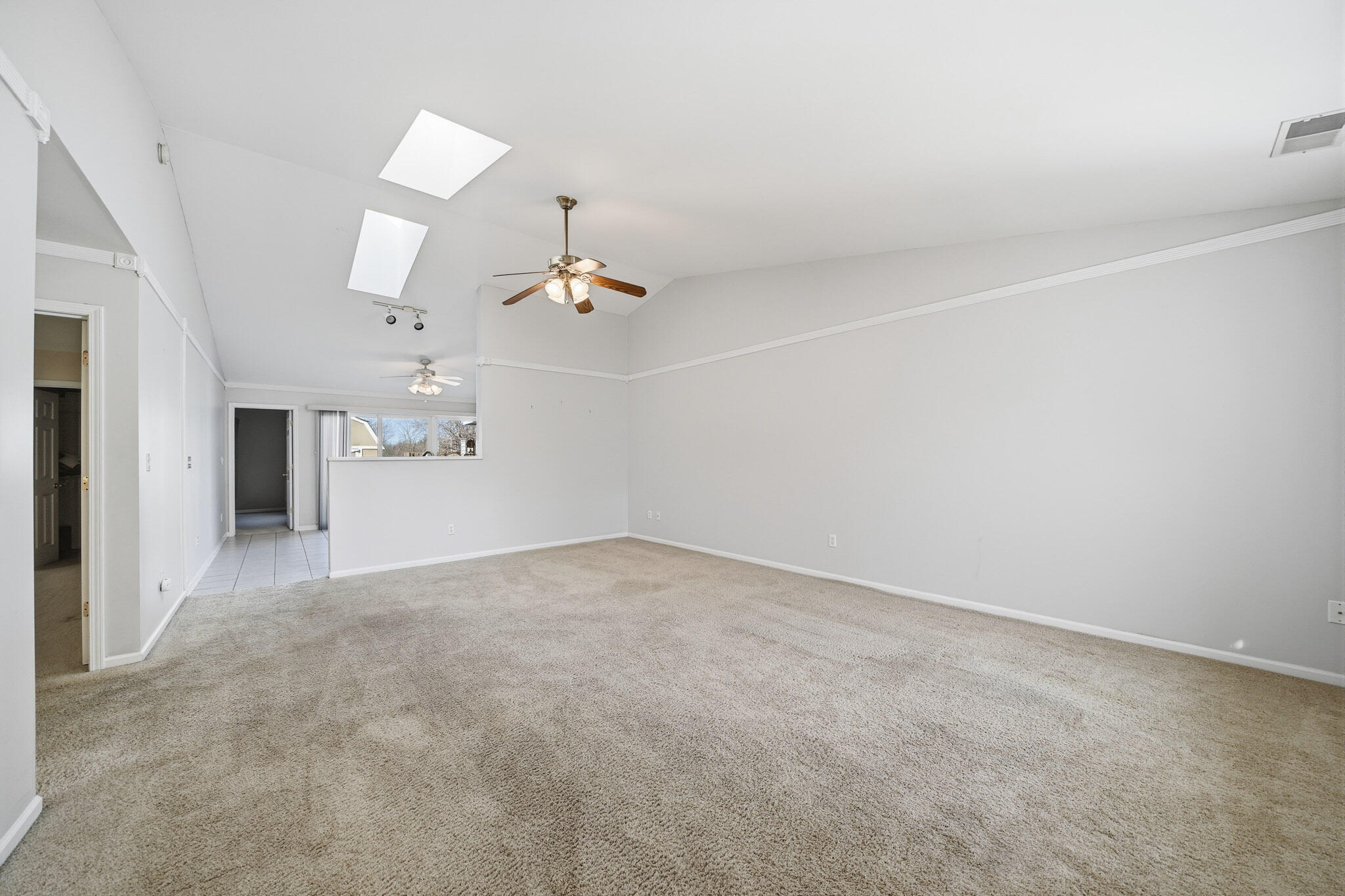 285 North Heather Lane Crown Point, IN 46307 - Photo 4 of 17 an empty room with a empty space and chandelier fan