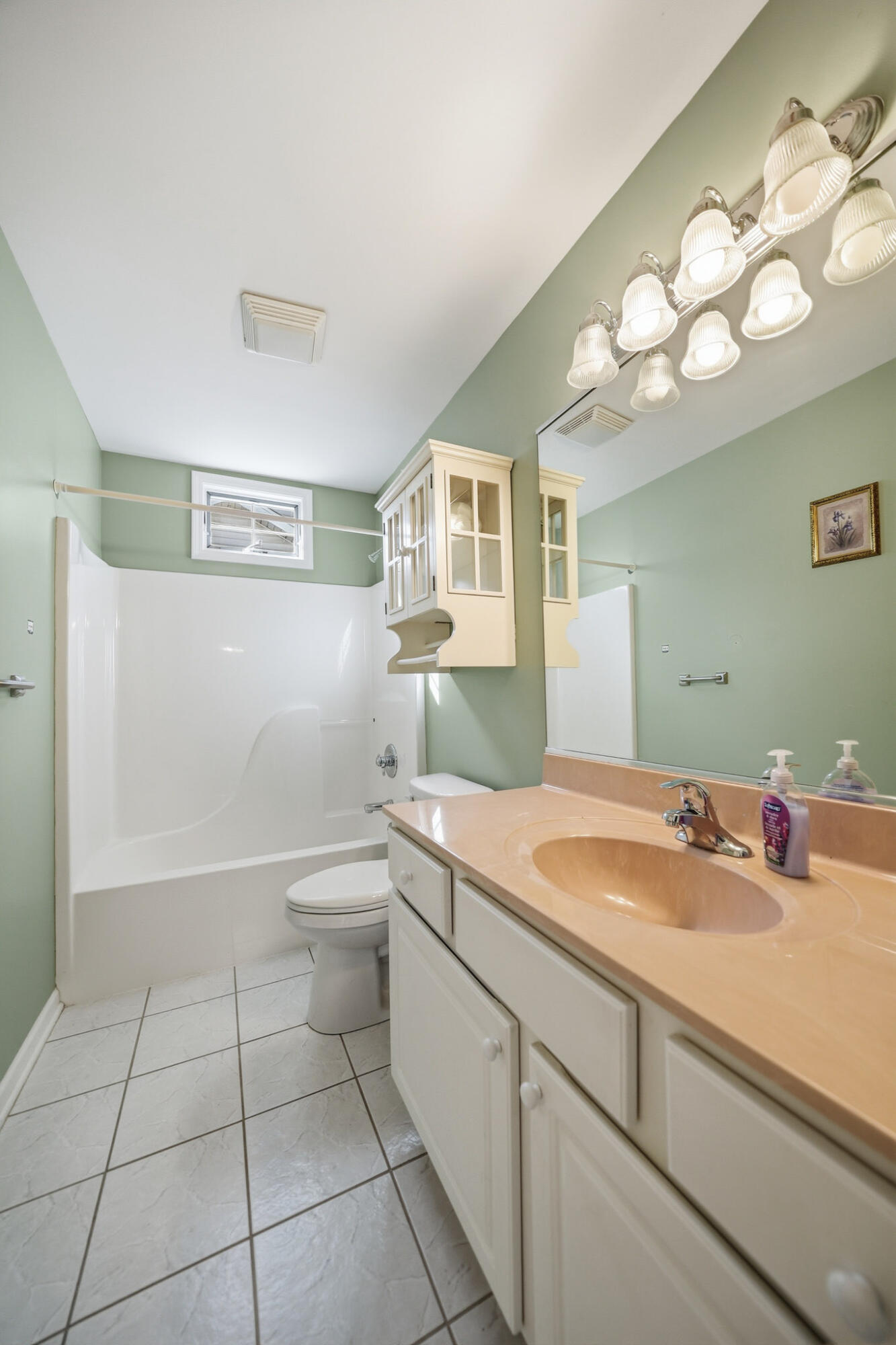 285 North Heather Lane Crown Point, IN 46307 - Photo 9 of 17 a bathroom with a sink a toilet and a mirror