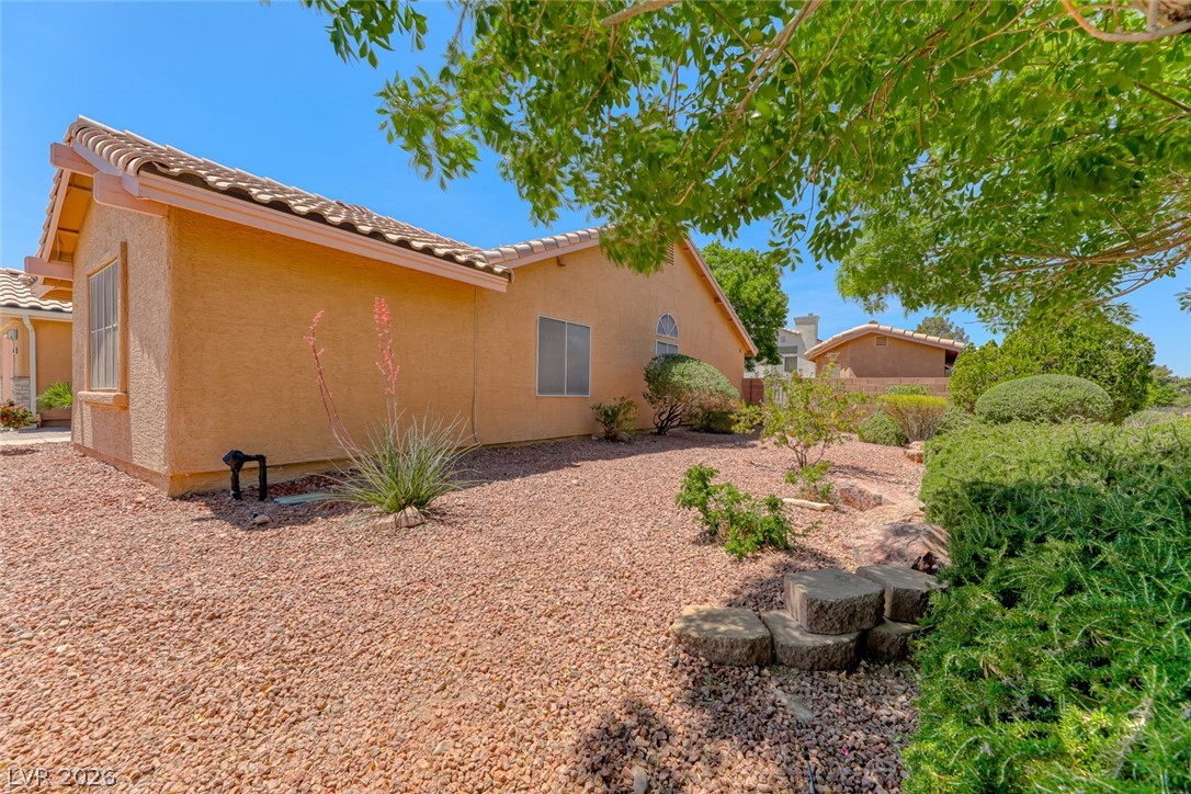 2001 Appaloosa Road Henderson, NV 89002 - Photo 10 of 44 This charming home offers a serene outdoor retreat with desert-friendly landscaping.